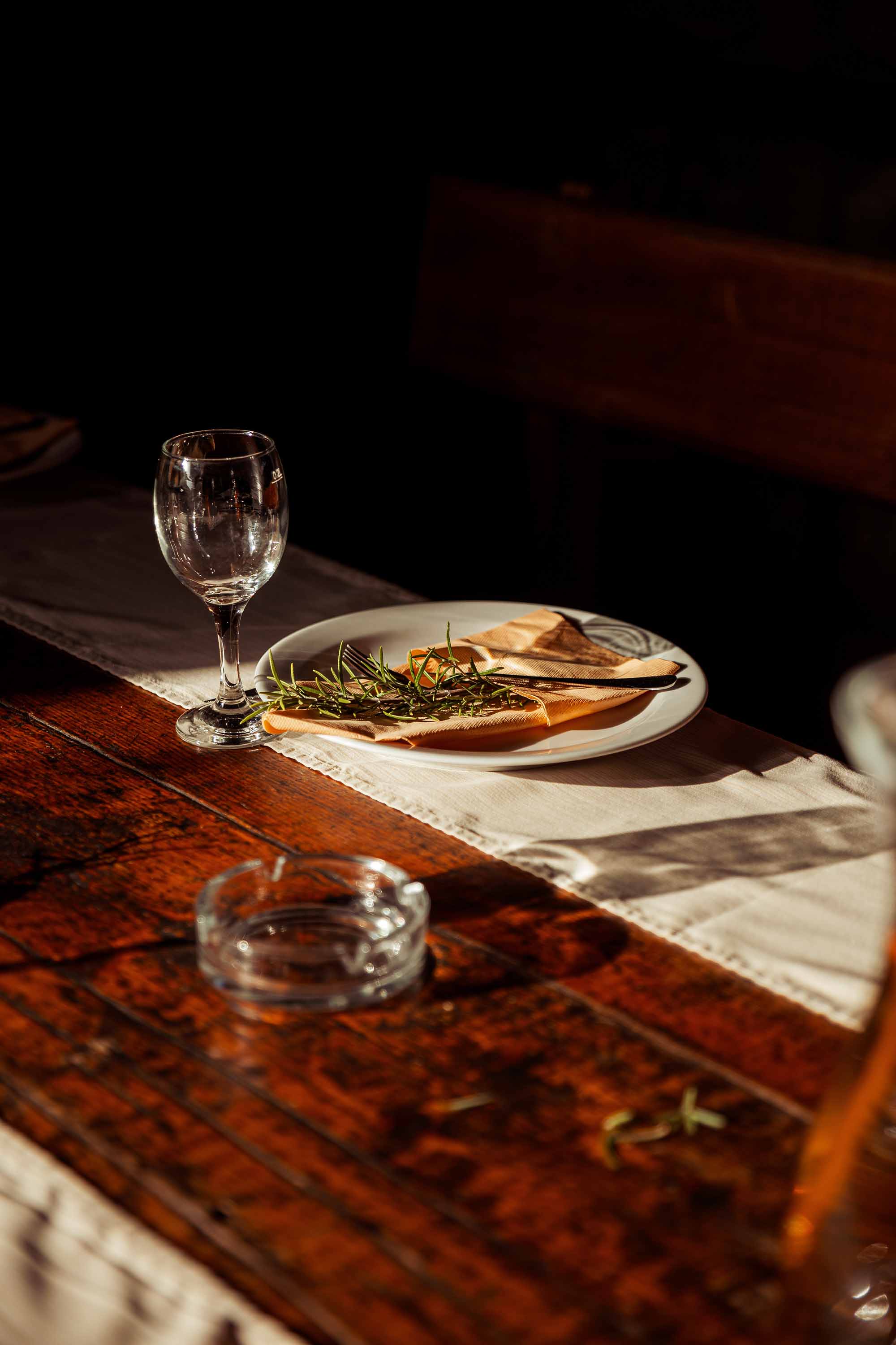 table with food and vine bottles